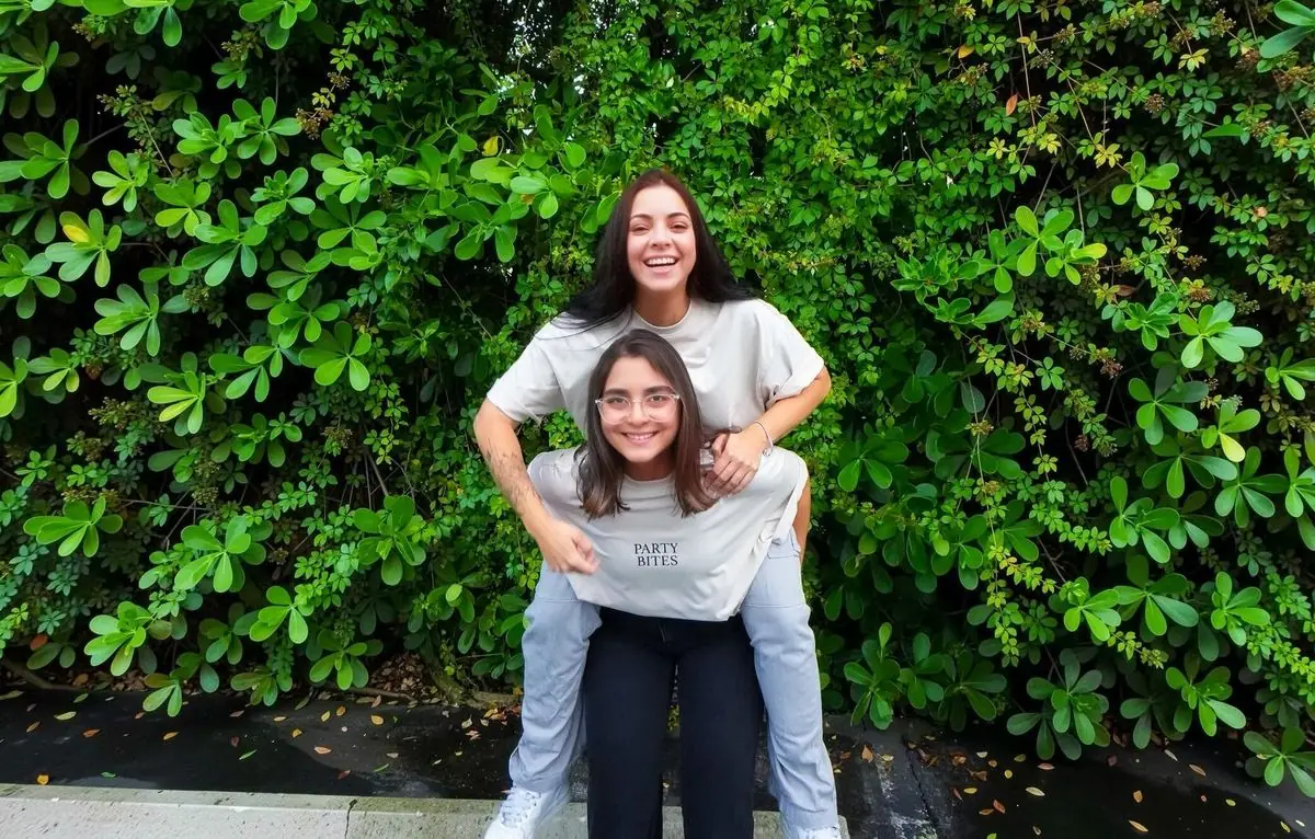 Lorena and Carolina laughing together